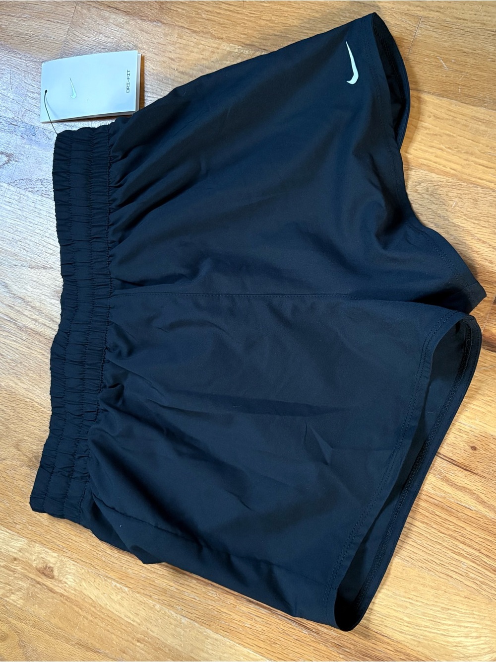 Nike Black Women's Athletic Running Shorts with White Swoosh